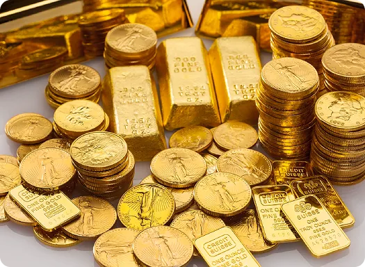 Gold coins and gold bars stacked together, symbolizing wealth and prosperity in a luxurious setting.